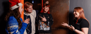 “Corporate team building activity with colleagues solving puzzles in an immersive escape room”